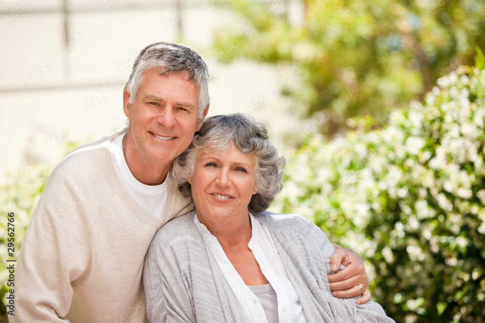 Retired couple looking at the camera Retired couple looking at the camera
