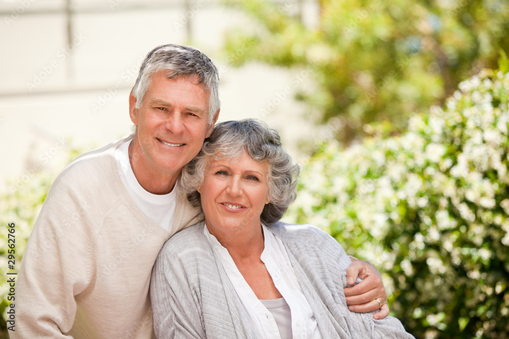 Retired couple looking at the camera