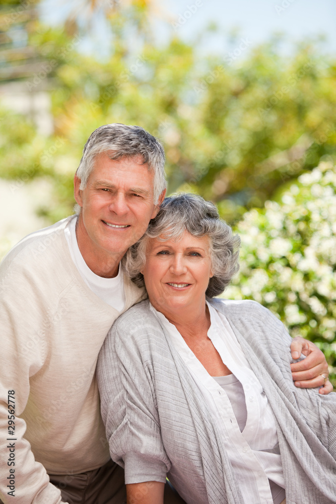 Retired couple looking at the camera Retired couple looking at the camera