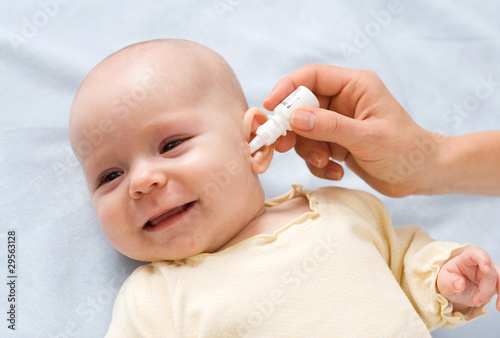 baby taking medicine