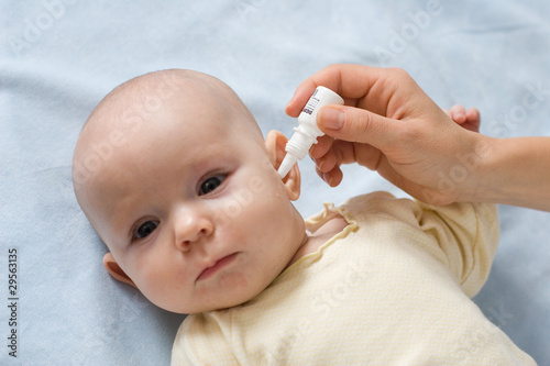 baby taking medicine