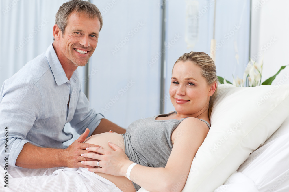 Adorable couple looking at the camera Adorable couple looking at the camera