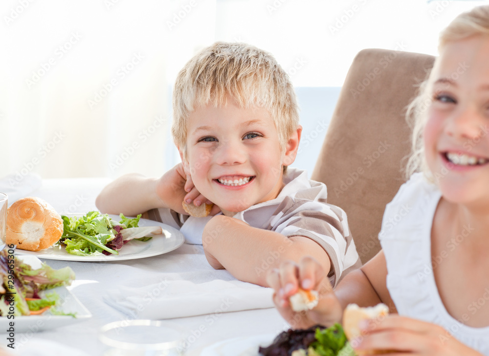 Happy children at the table