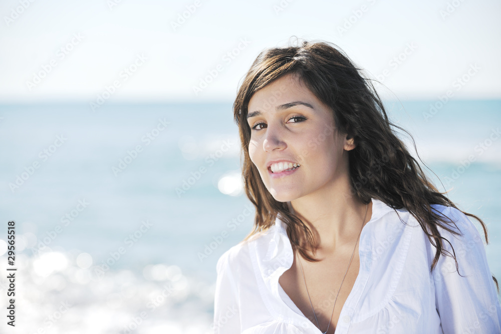 happy young woman on beach