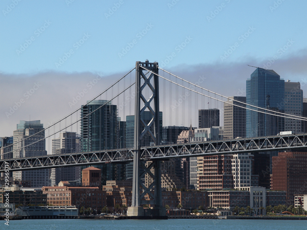 San Francisco Bay Bridge Tower with the City Skyline in the back