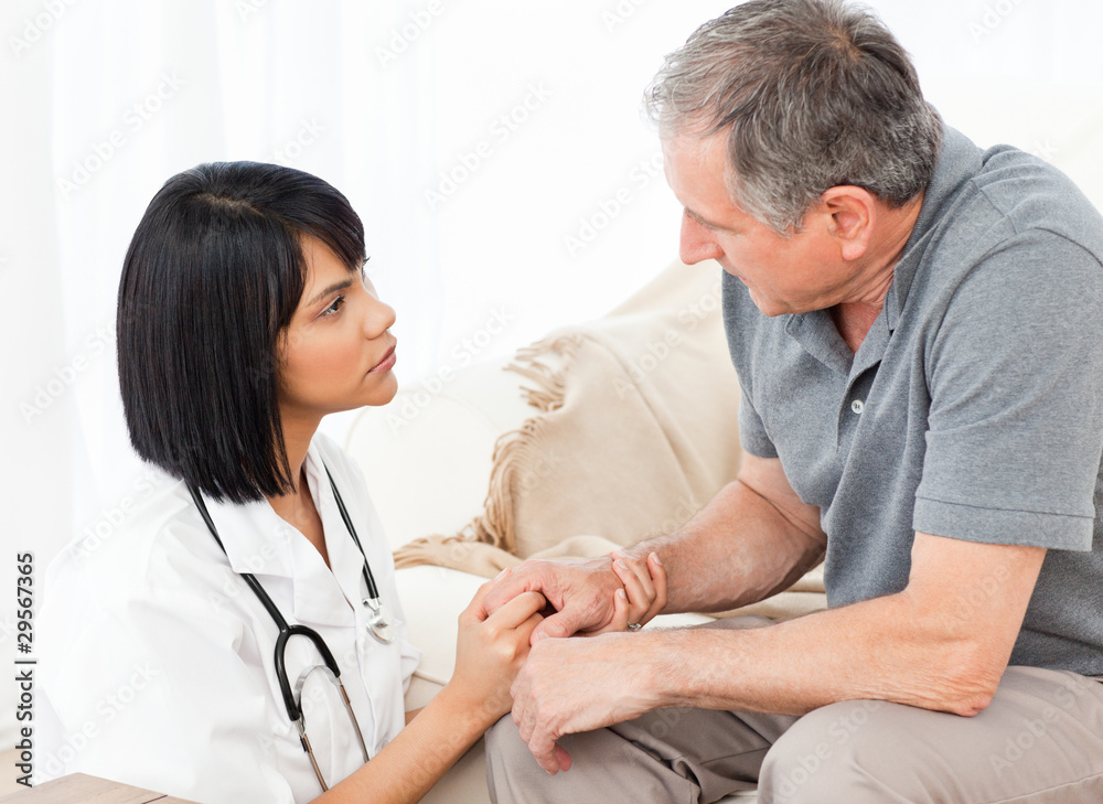 Fototapeta premium Man talking with his nurse