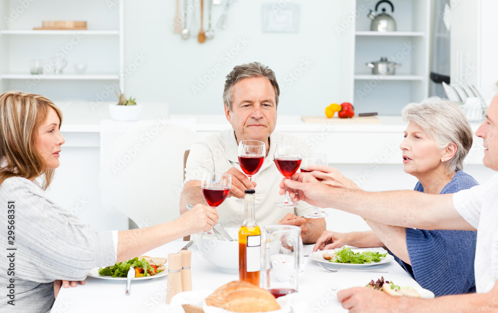Retired friends toasting together Retired friends toasting together