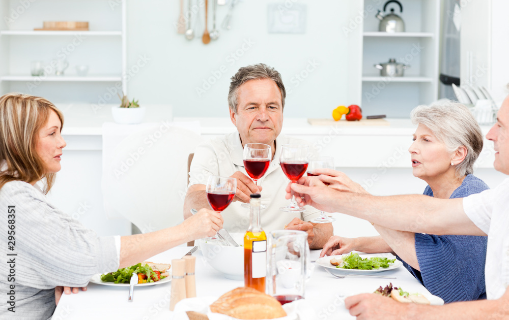 Retired friends toasting together