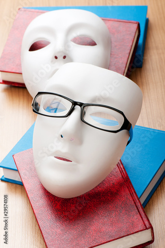Reading concept with masks, books and glasses