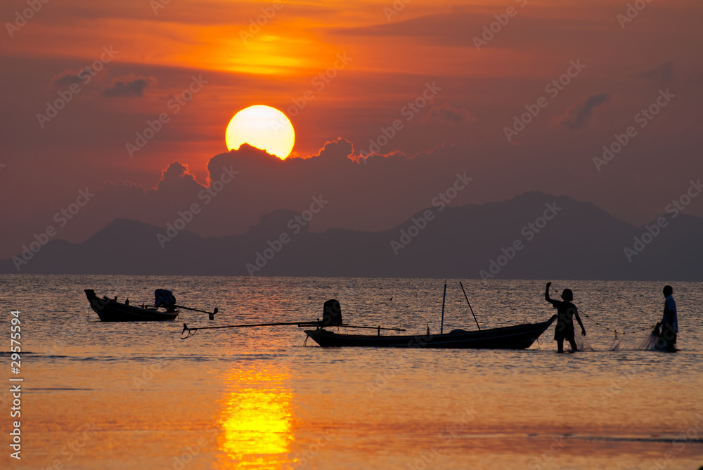 lontail boat sunset beach