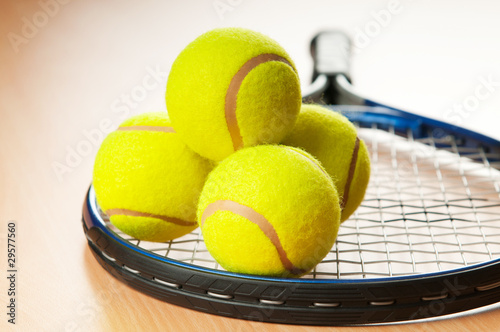 Tennis concept with balls and racket