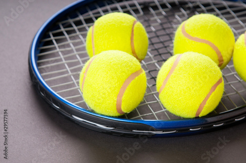 Tennis concept with balls and racket © Elnur