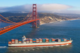 Container cargo ship under Golden Gate bridge