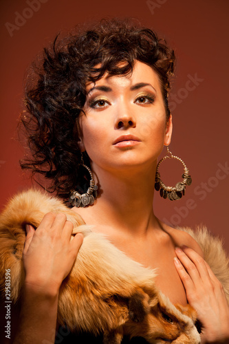 gorgeous Asian woman with curly hairstyle