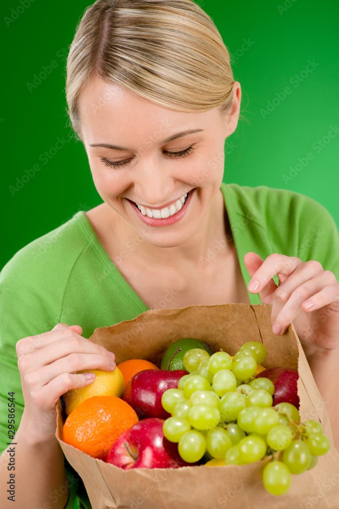 Healthy lifestyle - woman with fruit shopping paper bag Healthy lifestyle - woman with fruit shopping paper bag