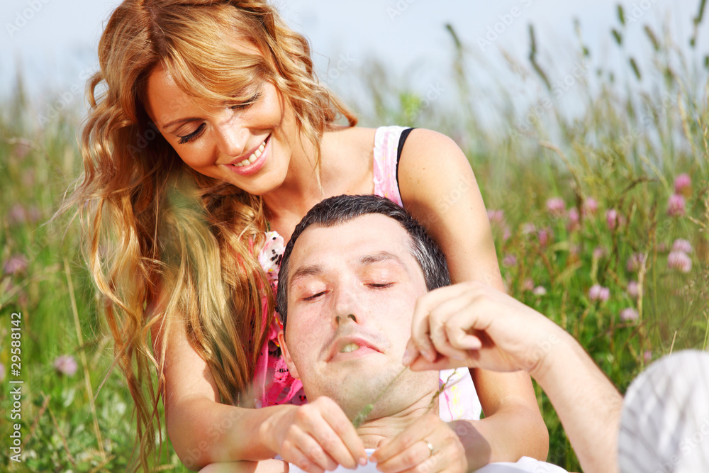 lovers on grass field lovers on grass field