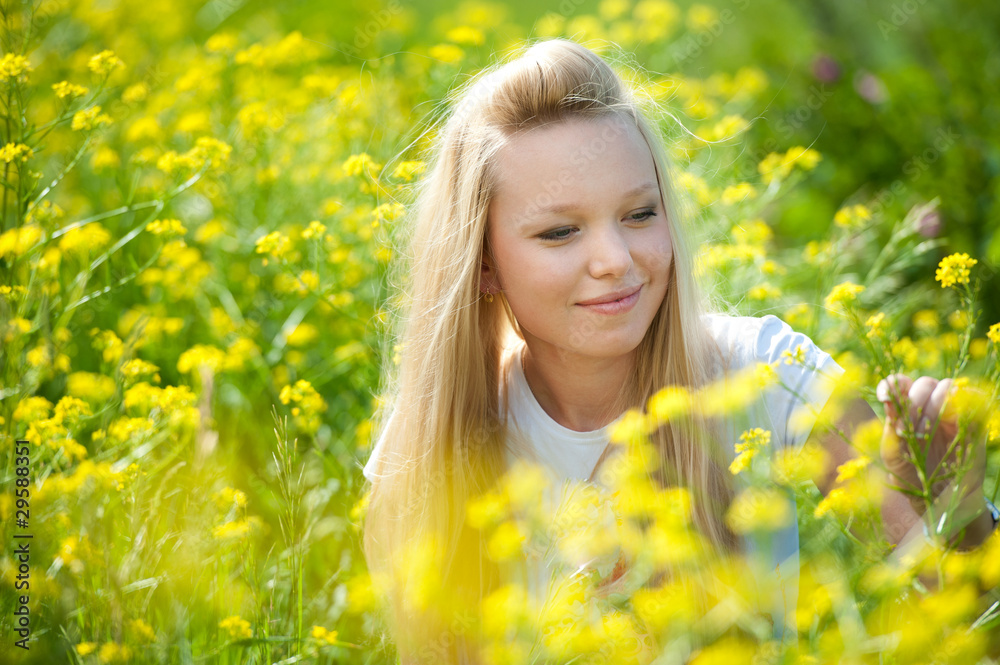 Young teenager girl with single flower