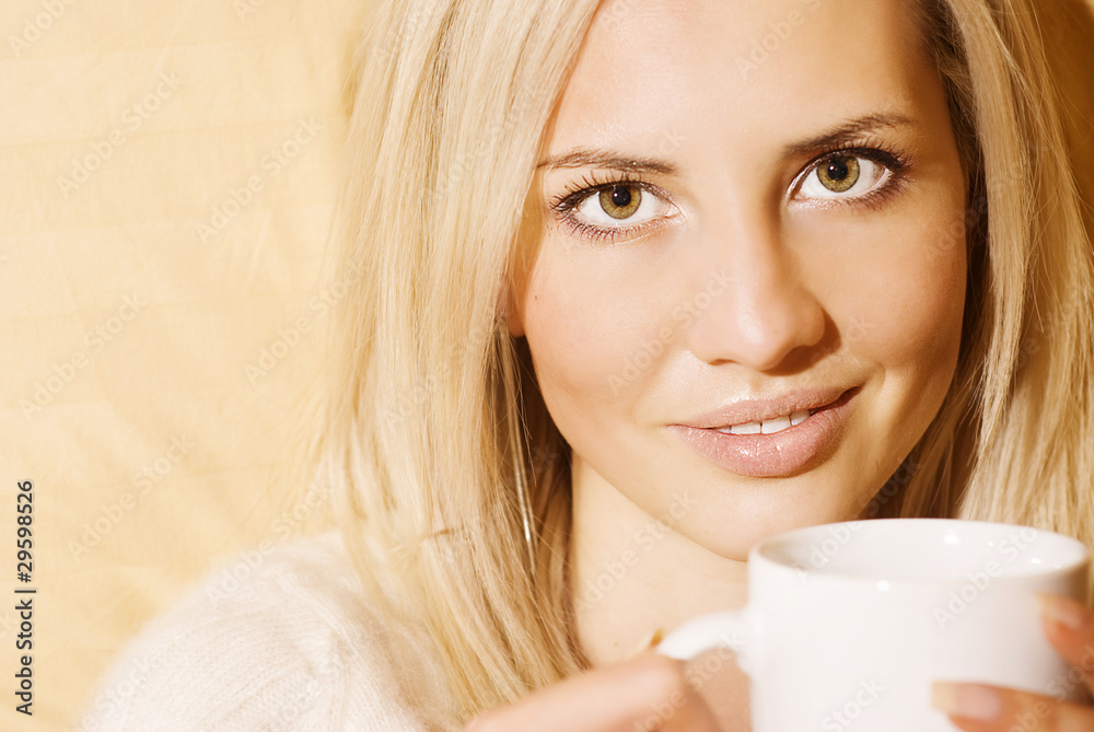 beautiful young blond woman relaxing on the bed at home beautiful young blond woman relaxing on the bed at home