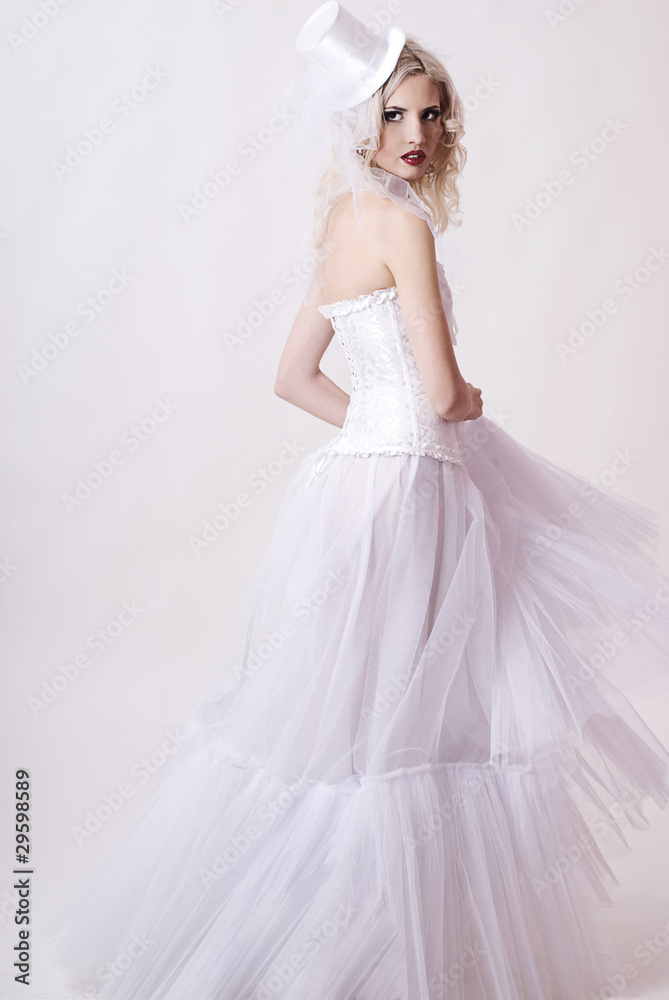 Beautiful bride with wedding hairstyle side view Beautiful bride with wedding hairstyle side view