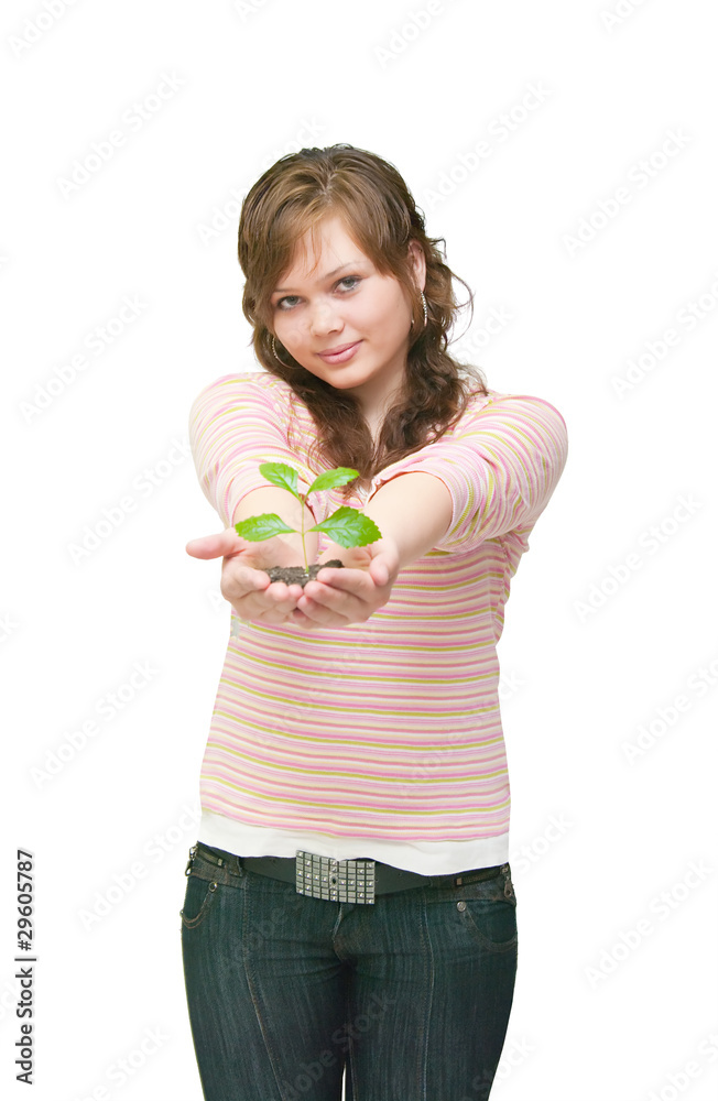 Closeup portrait of a beautiful happy young woman holding plant Closeup portrait of a beautiful happy young woman holding plant