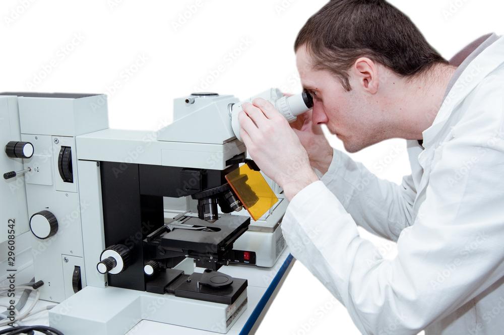 scientist doing research on microscope scientist doing research on microscope