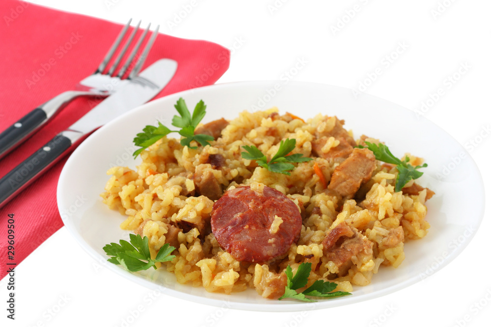 rice with pork, sausages and parsley