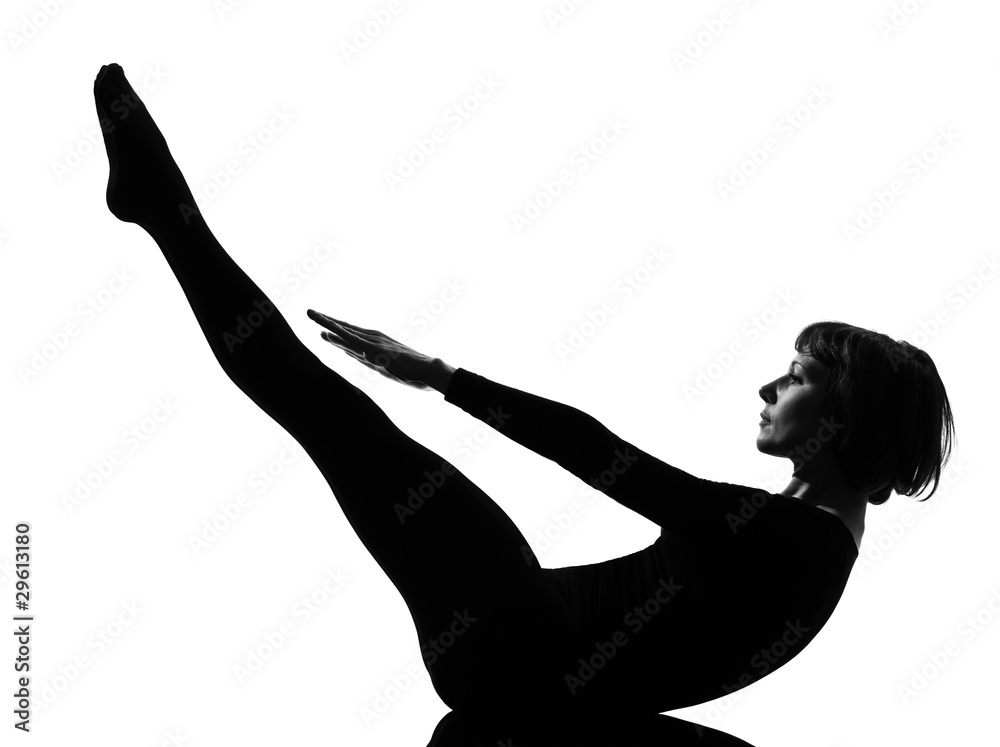 Fototapeta premium woman paripurna navasana boat pose yoga