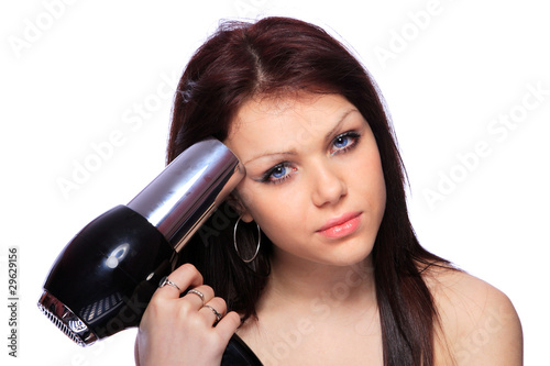 woman with fashion hairstyle holding hairdryer