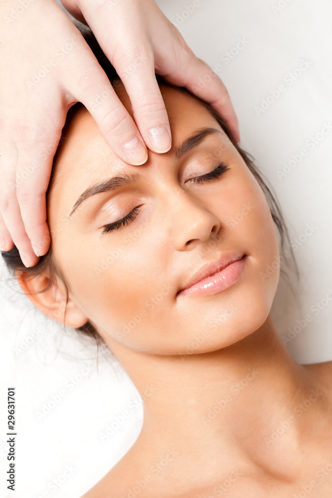 woman receiving face massage