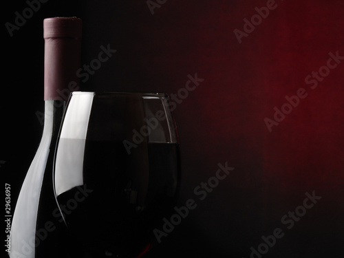 bottle with a wineglass