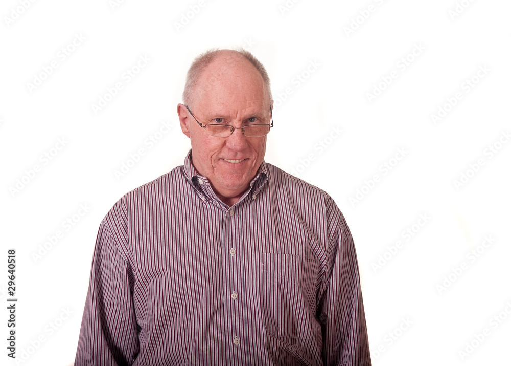 Older Bald Man in Striped Shirt Smiling Over Glasses. Older Bald Man in Striped Shirt Smiling Over Glasses.