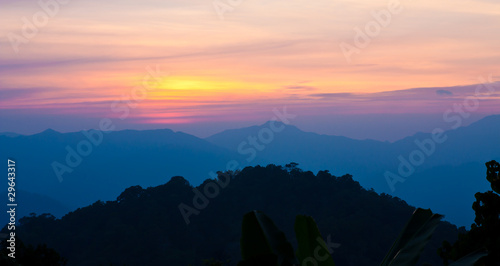 Sunset over mountains in Pechaburi,Thailand photo