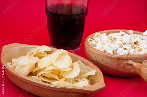 tomato chips, pop corn and cola