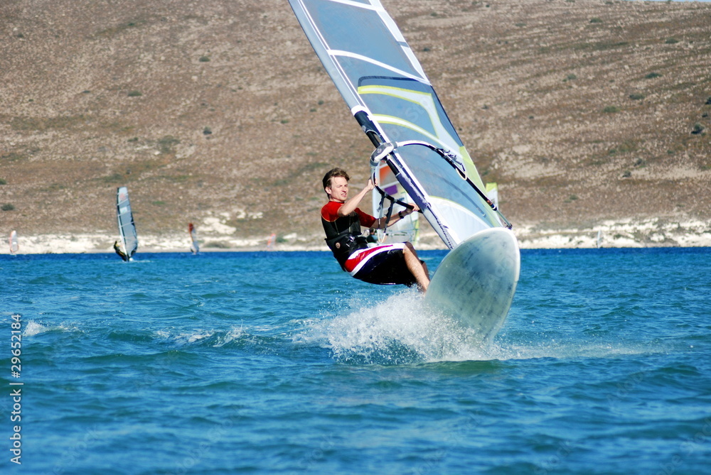 Naklejka premium windsurfing on the move