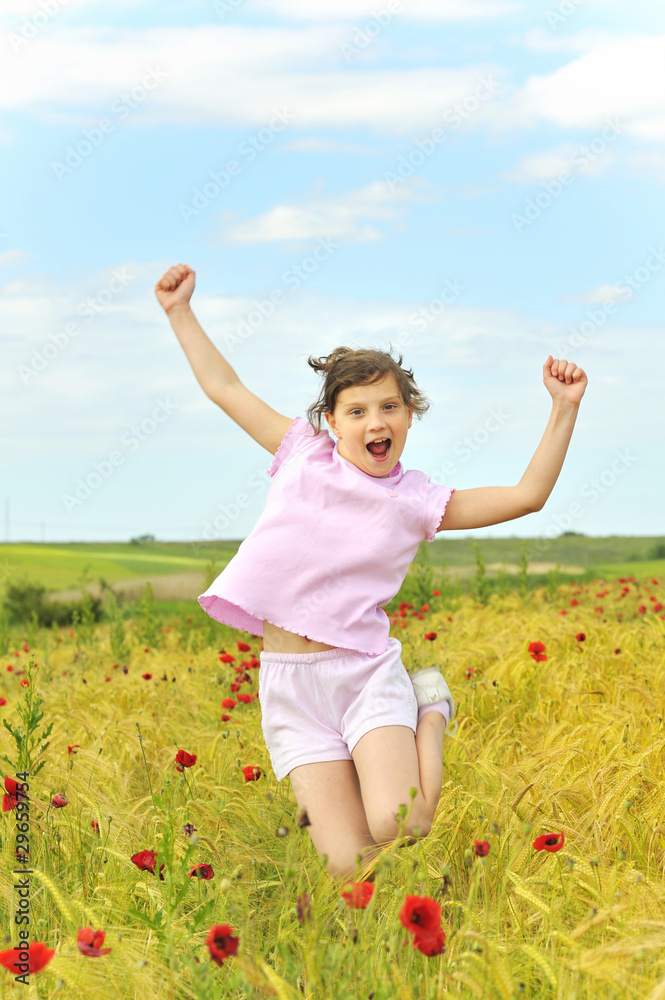 happy girl jumping on field happy girl jumping on field