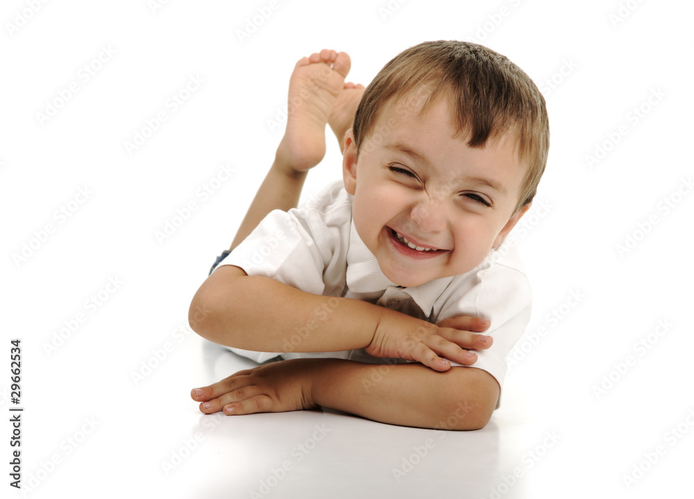 Very cute positive smiling little boy, isolated.