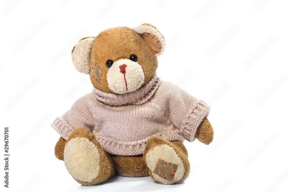 Obraz premium a brown teddy bear with patch on a head sited on white