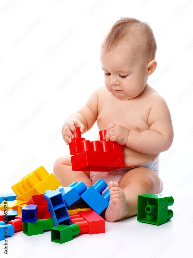 Little boy with building bricks Little boy with building bricks