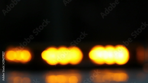 Blurred Flashing Yellow Emergency Lights