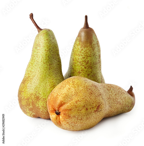 Three ripe pears (Conference) closeup on white background.