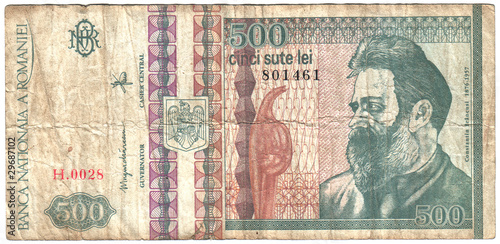 Old paper money of the Romania, on white background.