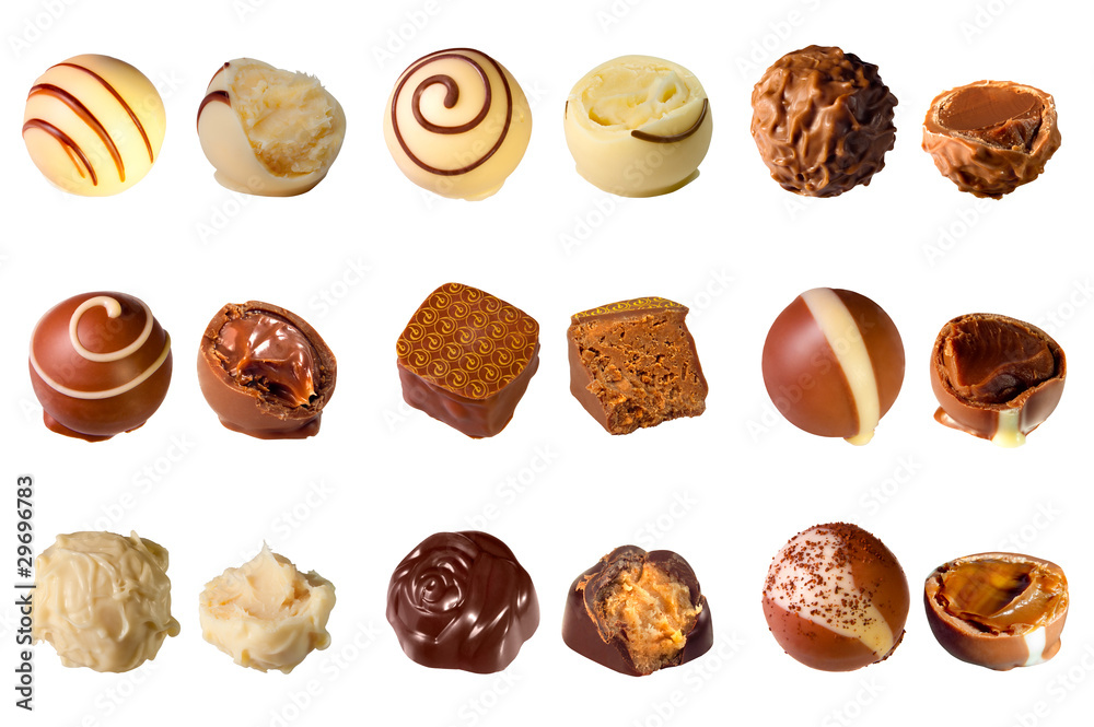 collection of mixed chocolates against a white background collection of mixed chocolates against a white background