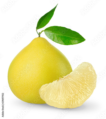 Isolated pomelo. One whole pomelo fruit with leaves and peeled segment isolated on white background photo
