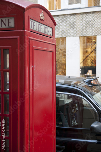 Detail of red phonebooth in London, UK.