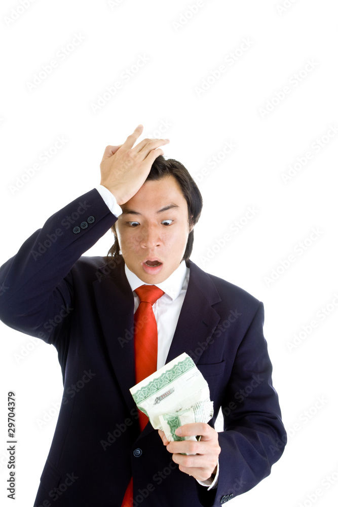 Shocked Asian Man Holding Stock Certificate Isol Shocked Asian Man Holding Stock Certificate Isol