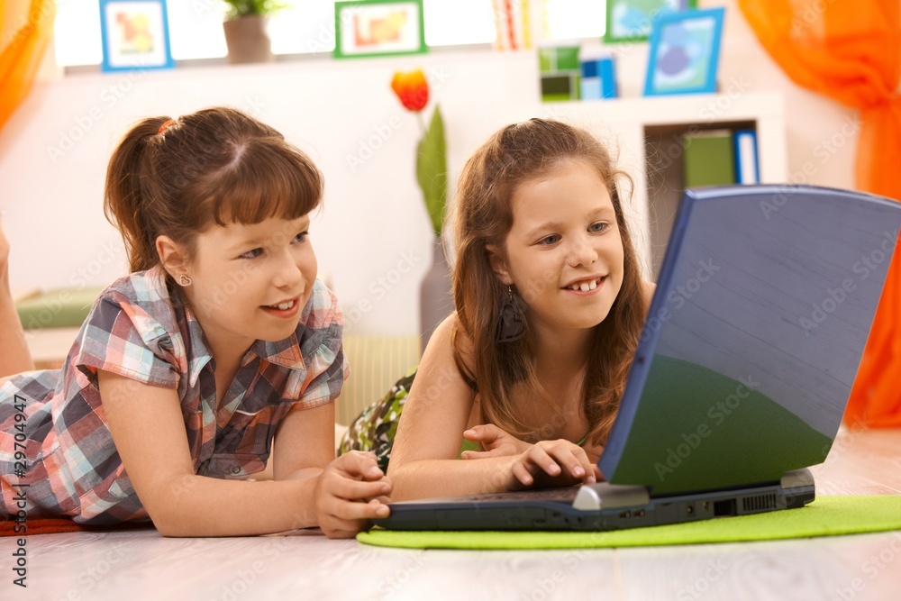 Children using computer at home Children using computer at home