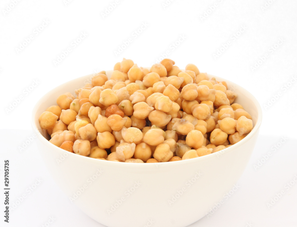Cooked chickpea in white bowl detail Cooked chickpea in white bowl detail