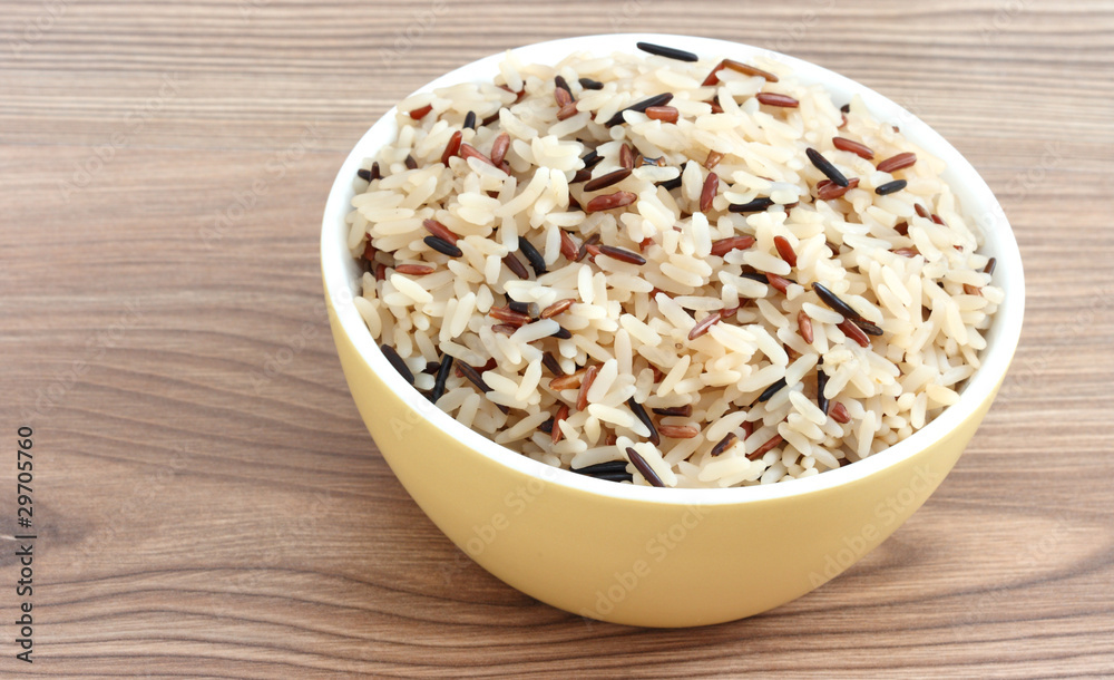 Detail of bowl with cooked rice of various types Detail of bowl with cooked rice of various types