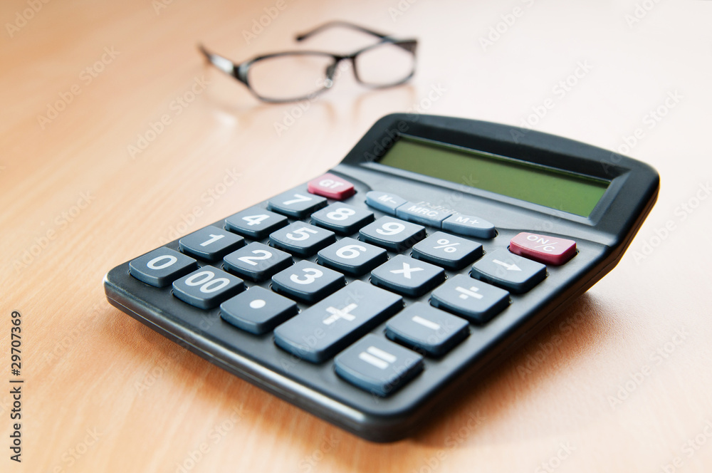 Business concept with accounting calculator Business concept with accounting calculator