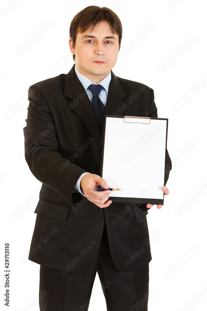 Serious businessman with documents and pen for your signing